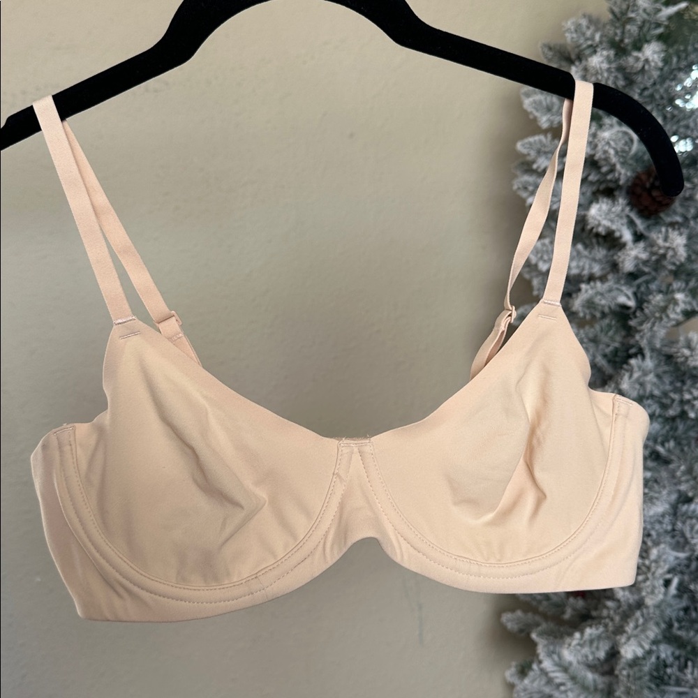 SKIMS FITS EVERYBODY UNLINED DEMI BRA STYLE: BR-UWR-2293 COLOR SAND SIZE 38B‎
